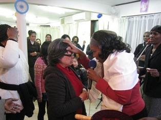 Apostle Carol praying for the anointing of the Holy Spirit