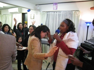 Apostle Carol praying for the anointing of the Holy Spirit