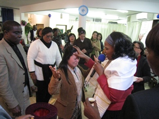 Apostle Carol praying for the anointing of the Holy Spirit