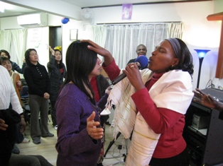Apostle Carol praying for the anointing of the Holy Spirit