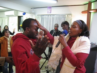 Apostle Carol praying for the anointing of the Holy Spirit